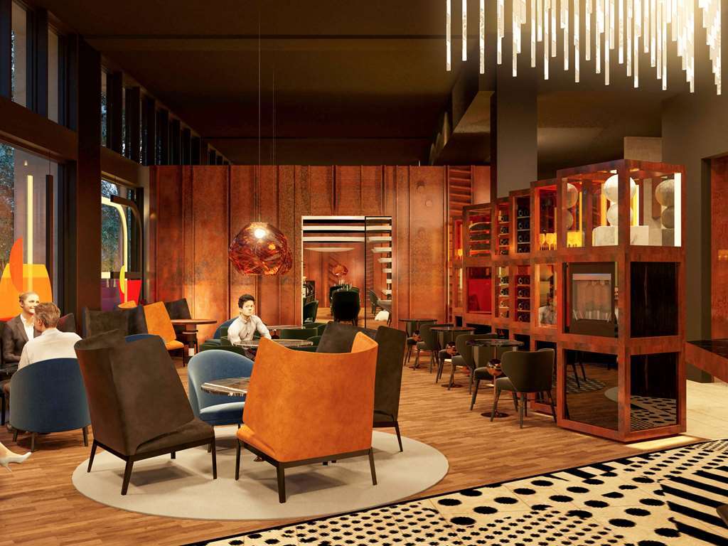 Pullman Berlin Schweizerhof Hotel Restoran foto The interior of the hotel